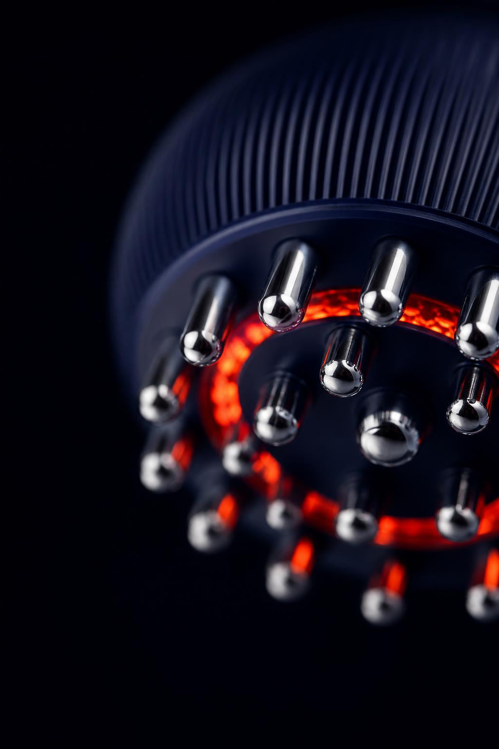 Detalle de las puntas de masaje del Nublora con luz roja